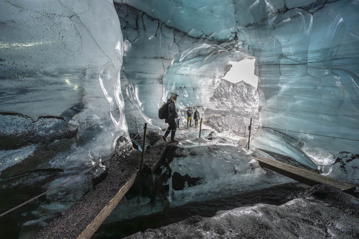 Bridges in the ice cave with people